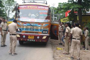 Police personnel stopped a bus of Krishnanagar-Karimpur route to talk to passengers