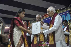 A student receiving degree from the Governor (Pranab Debnath)