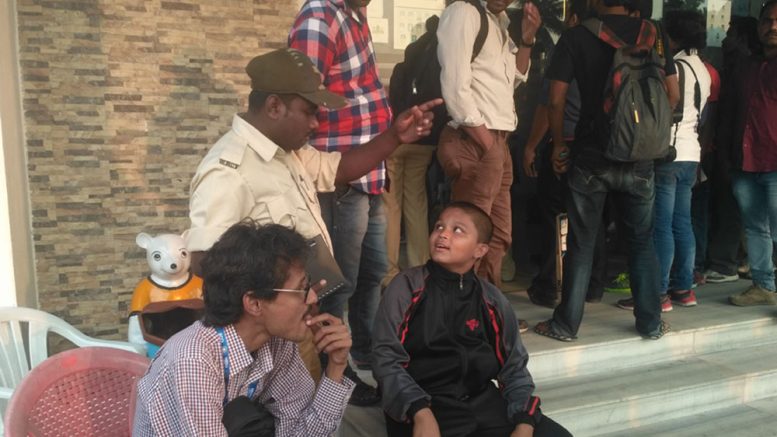 Sagar Biswas, 14, a class 9 student of Kalyani Pannalal Institution waiting outside the entrance of Bengal Cricket Academy for an autograph of Mahendra Sing Dhoni. Picture by Sovan Chaudhuri