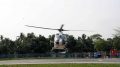 A helicopter in trial landing at the Govt College helipad for visit of CM Mamata Banerjee