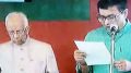 Ujjwal Biswas being sworn in as Minister by Governor Kesharinath Tripathy
