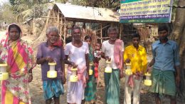 Villagers in Char Kurmipara with the nonfunctioning CFL lantern given by the Nadia administration. NfN Picture