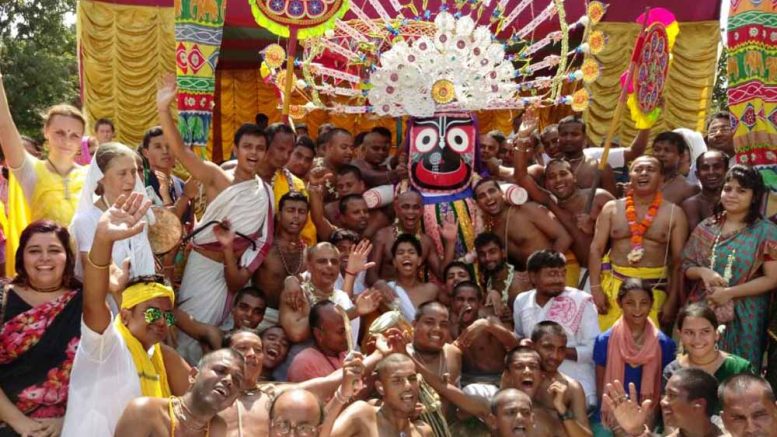 The deity of Lord Jagannath being taken for installation to the chariot in Rajapur by the devotees. Picture by Subrata Biswas