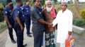 Mohammed Mamunur Rashid shakes hand with Moslem Munshi (in blue safari) while his father Mohammed Karim looks on before leaving Indian territory in Gede on Sunday