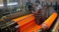 The weavers making the longest sari at a workshop in Krishnanagar. Picture by Abhi Ghosh