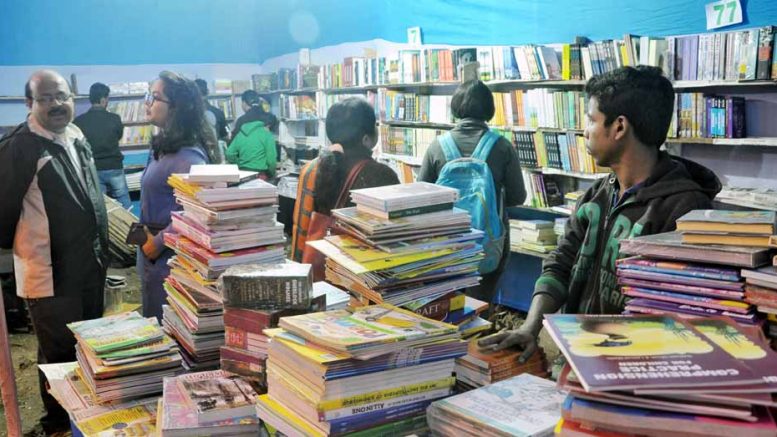 Book lovers in a stall at the venue of the fair