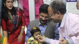 Jhulan on the lap of Hospital superintendent Dr.SN Sarkar while Pediatric AK Bera feeding her rice