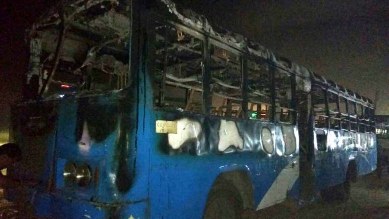 a state bus torched by mob in Debagram