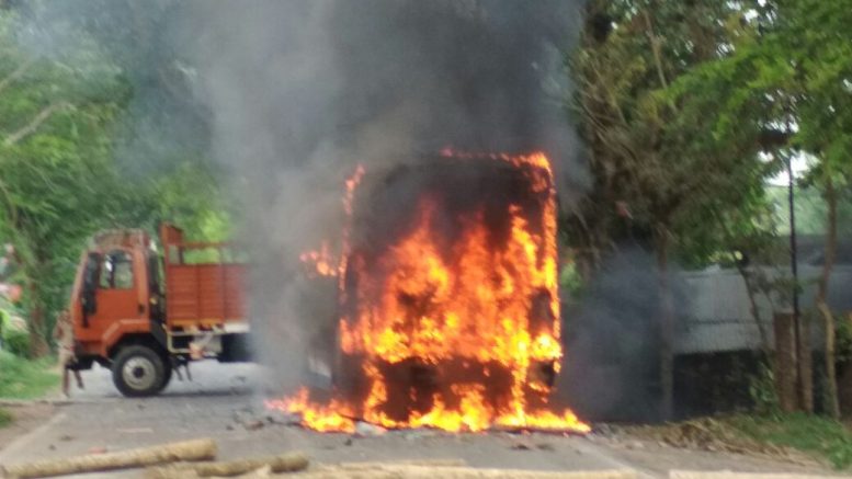 A state transport bus set on fire by mob in Mahisbathan