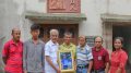 Saser Kangri expedition team of MAK with a portrait of Pemba Sherpa
