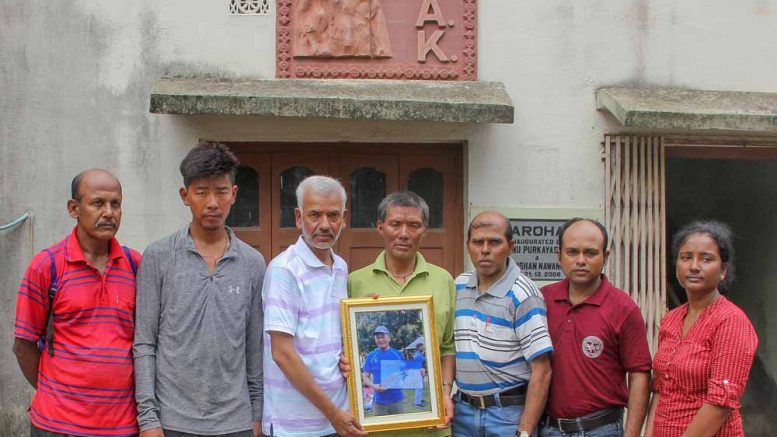 Saser Kangri expedition team of MAK with a portrait of Pemba Sherpa
