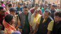 Bhagirathi Mahato and other women speaking to minister Partha Chatterjee