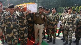 Mortal remains packed in a coffin being taken for last tributes in Jammu