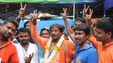 BJP winning candidate Jagannath Sarkar outside the counting venue in Ranaghat on Thursday