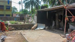 Foundation of incomplete building of Paresh Sarkar and his temporary tarpaulin shed