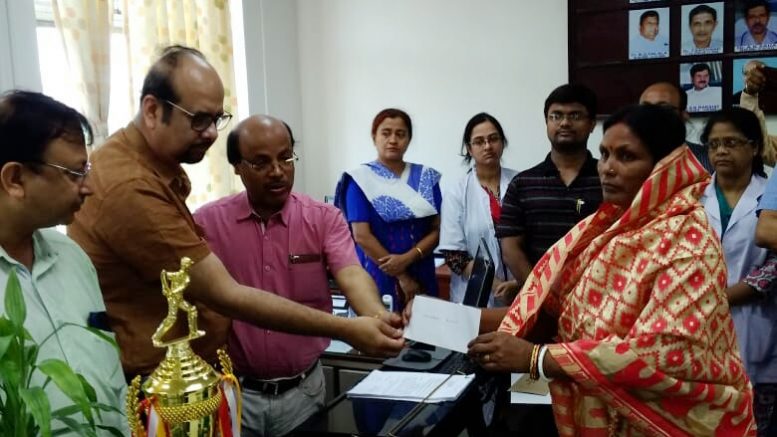 Mamata Biswas, mother of slain jawan Sudip Biswas receiving the cheque