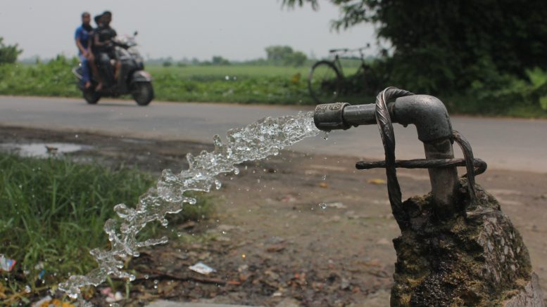 Water being drained out from a tap without a cock in Ranaghat