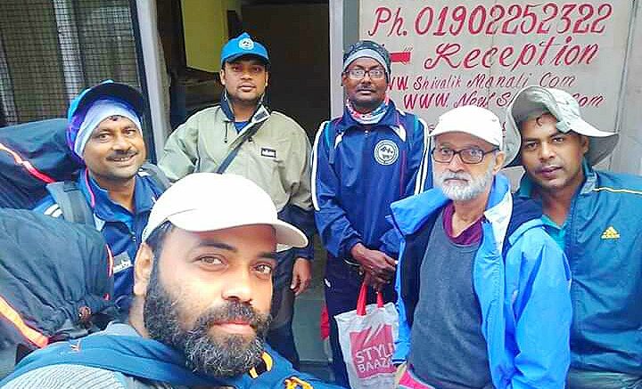 Saheb (in front) with other team members