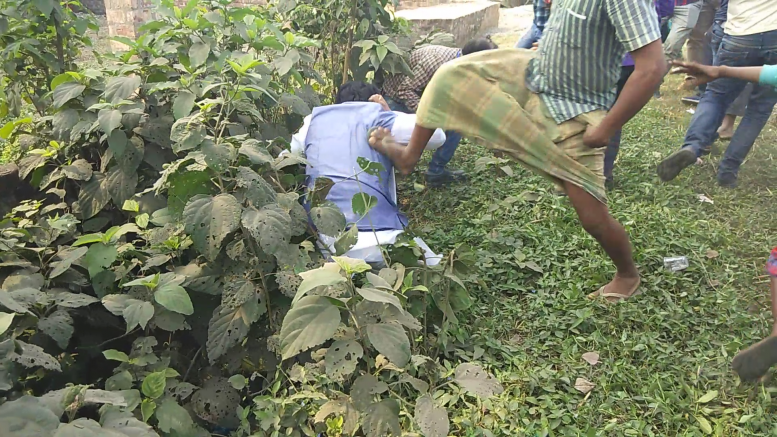 BJP candidate Jay Prakash Majumdar being kicked by a suspected Trinamul activist in Ghiaghata on Monday